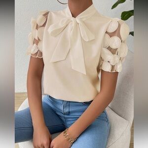 Elegant Beige Women's Top with Bow Detail